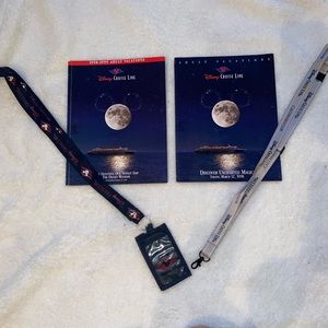 Inaugural DCL sailing books and lanyards